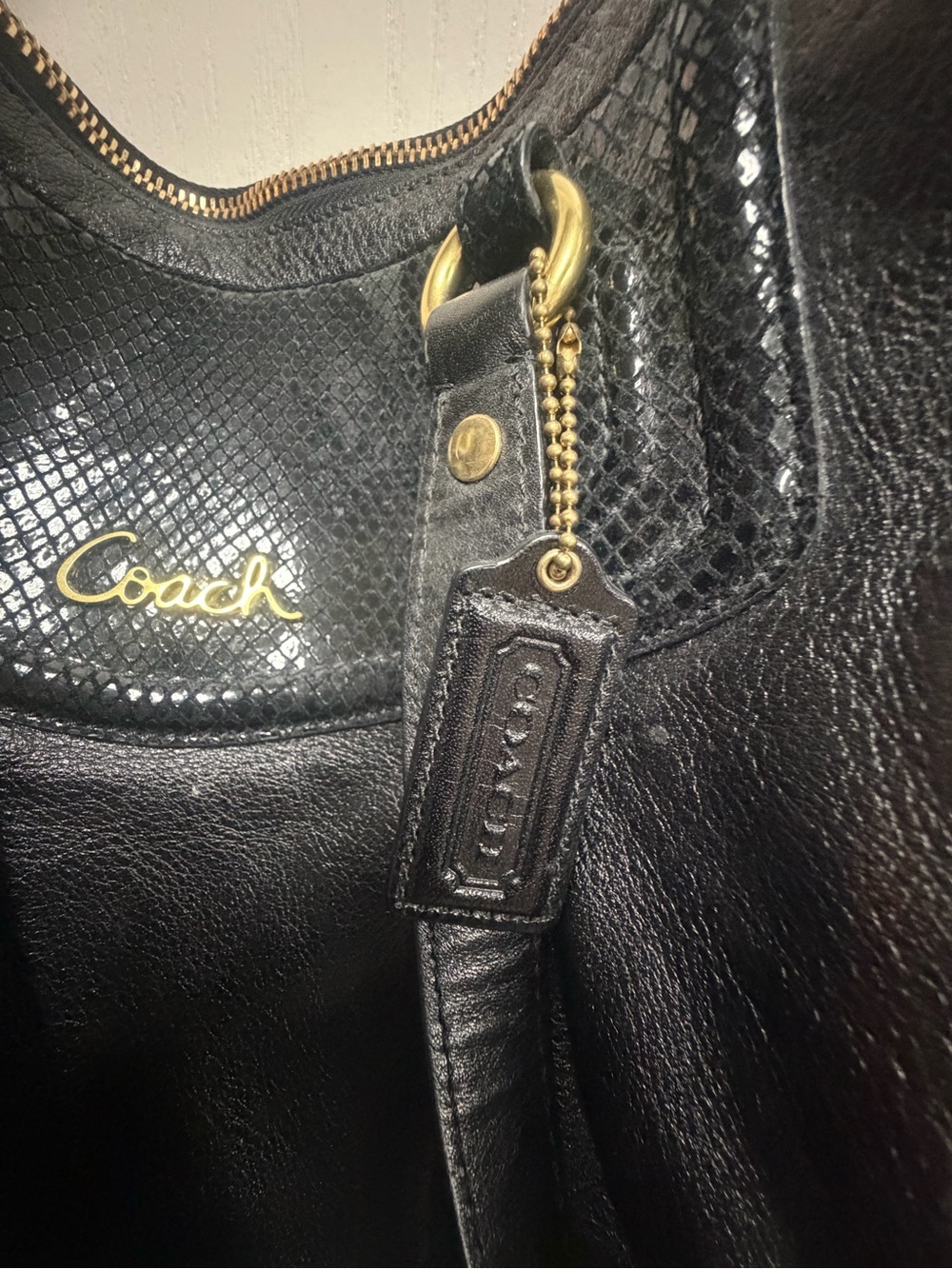 Coach Black Leather Shoulder Bag with Gold Accents